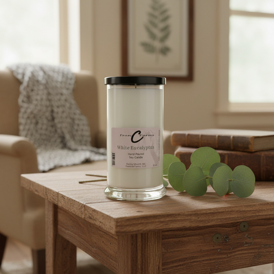 White Eucalyptus Soy Candle in a stylish jar on a wooden table, perfect for relaxation and self-care.