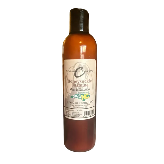 Honeysuckle Jasmine Goat Milk Lotion bottle showcasing its floral scent and creamy texture.