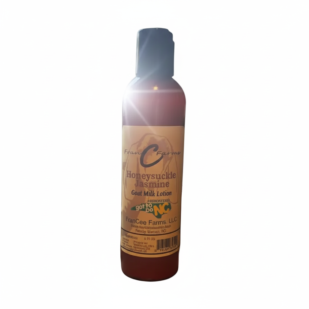 Honeysuckle Jasmine Goat Milk Lotion in a bottle with floral scent, perfect for summer skincare.