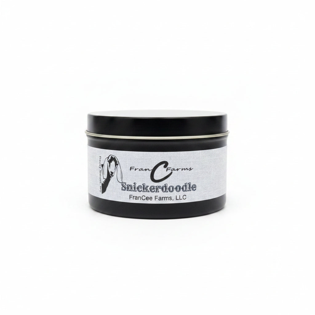 Snickerdoodle soy candle in a black tin container by FranCee Farms, featuring a simple label design.