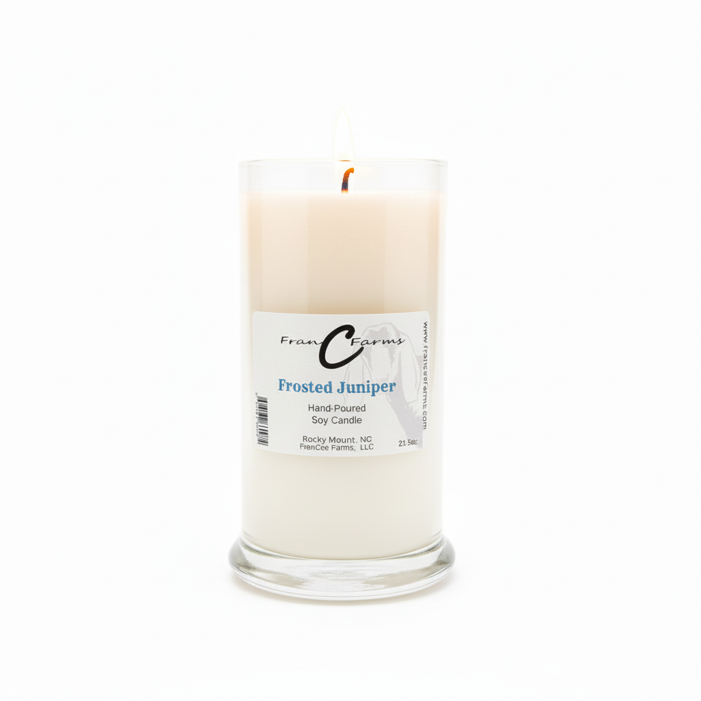 Frosted Juniper Soy Candle - 22 oz. Status Jar with a warm and inviting glow.