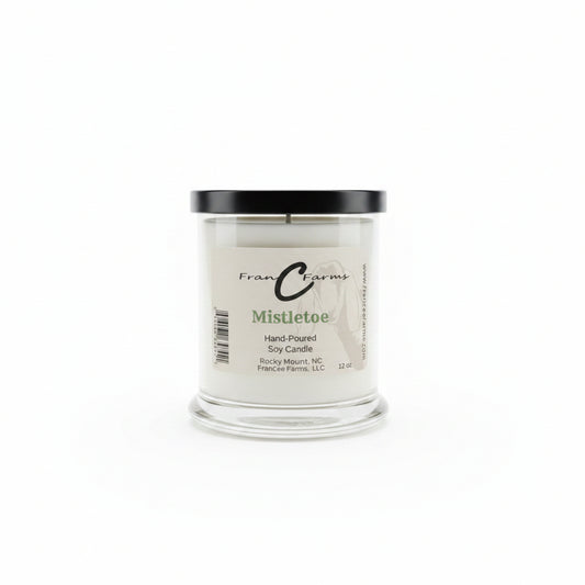 Mistletoe Soy Candle - 12 oz. jar with black lid, perfect for creating a festive holiday atmosphere.