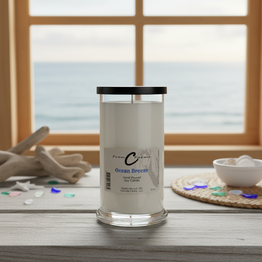 Ocean Breeze Soy Candle in a stylish jar with ocean view in the background, perfect for a coastal ambiance.
