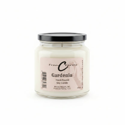 Gardenia Soy Candle - 18 oz. hand-poured candle in an apothecary jar with a black lid.