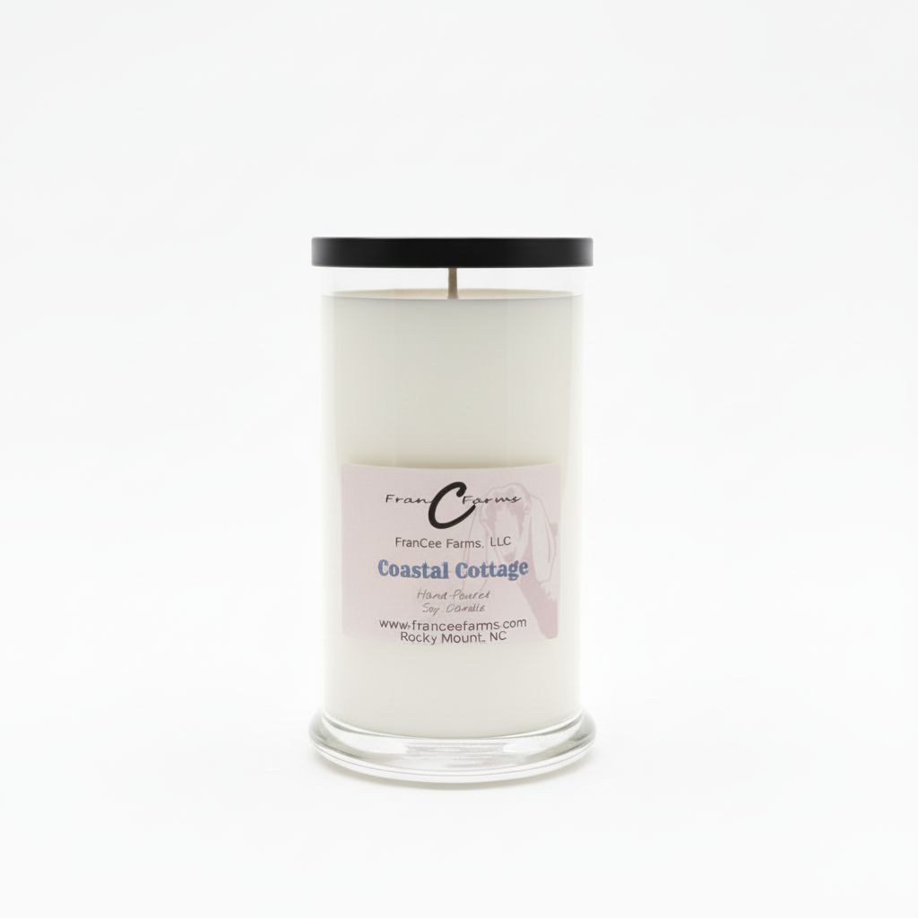Coastal Cottage Soy Candle in a clear glass jar with a black lid, offering a beachside sanctuary scent experience.