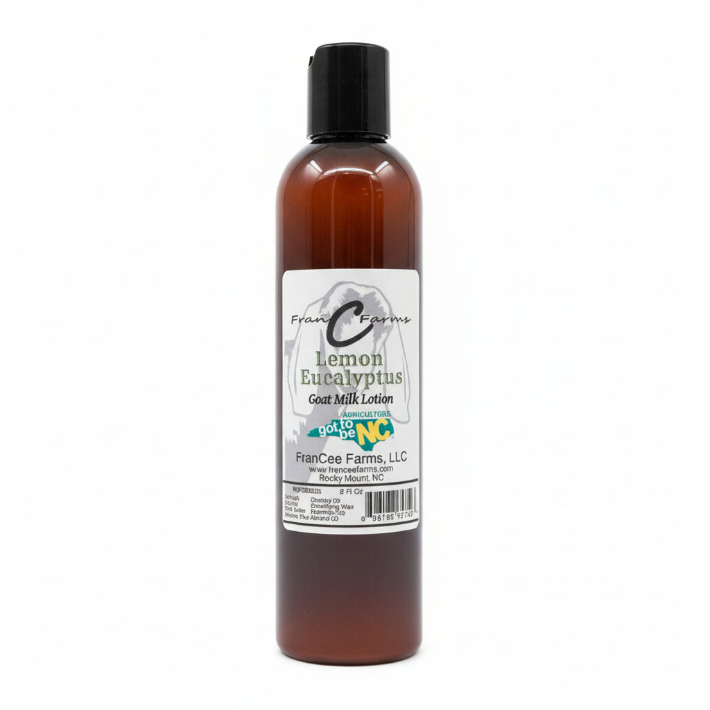 lotion bottle of lemon eucalyptus goat milk lotion on a wooden shelf
