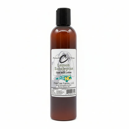 lotion bottle of lemon eucalyptus goat milk lotion on a wooden shelf