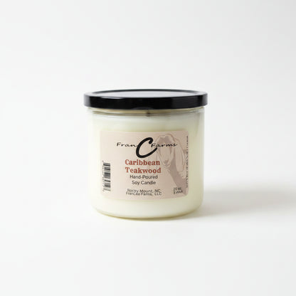 Caribbean Teakwood Soy Candle - 30 oz. hand-poured with a black lid and label design showcasing its rich fragrance.