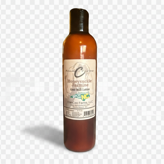 Honeysuckle Jasmine Goat Milk Lotion bottle showcasing its floral scent and creamy texture.