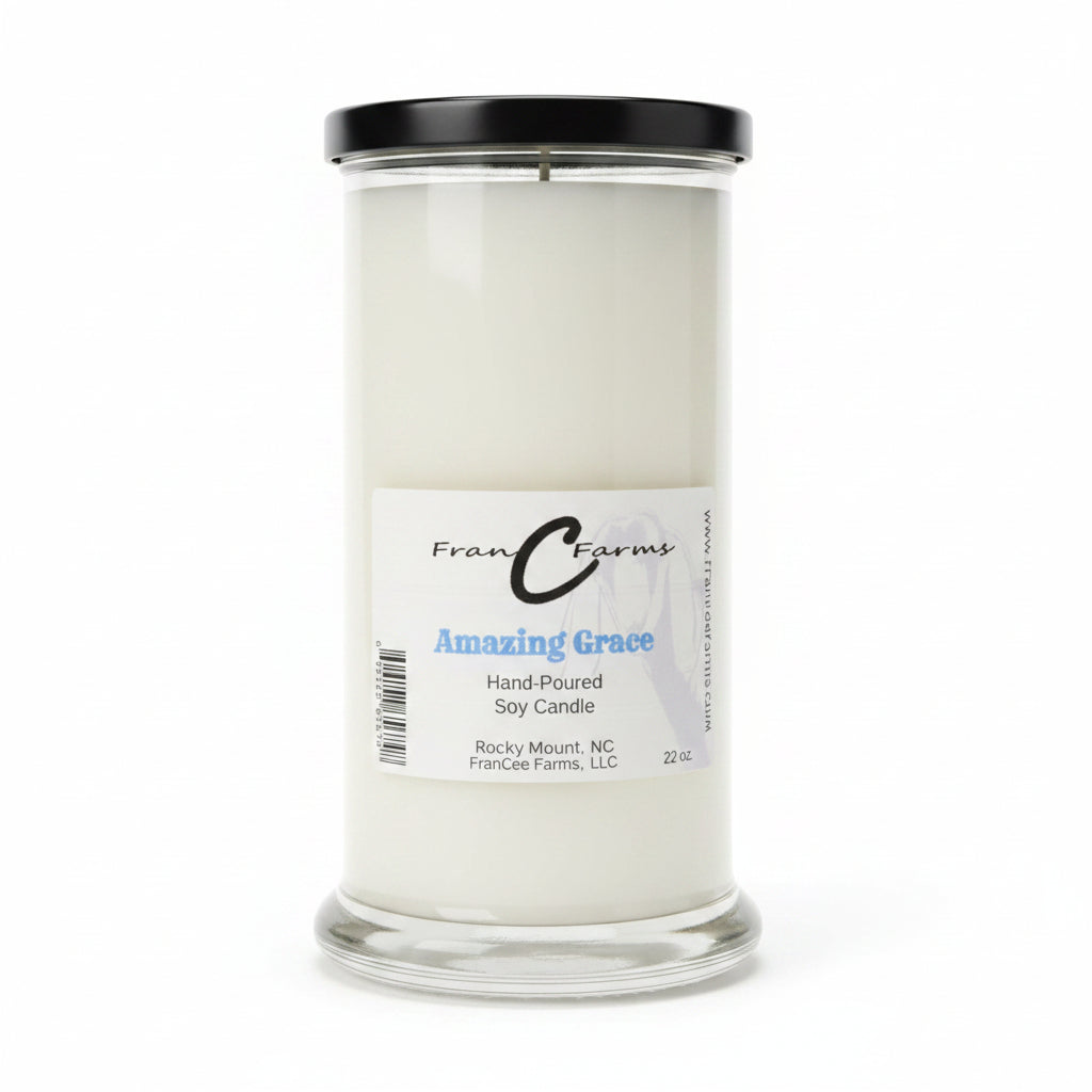 Amazing Grace soy candle in a clear 22 oz. status jar with a black lid, featuring a simple label design.