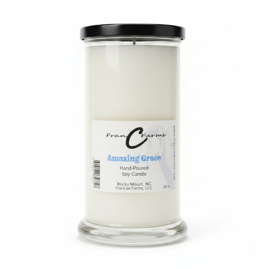 Amazing Grace soy candle in a clear 22 oz. status jar with a black lid, featuring a simple label design.