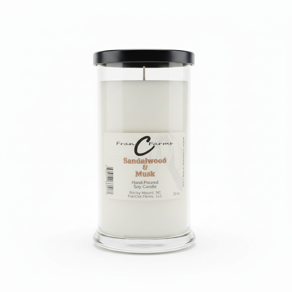 Sandalwood & Musk Soy Candle - 22 oz. Hand poured in a clear jar with a black lid for a warm, earthy ambiance.