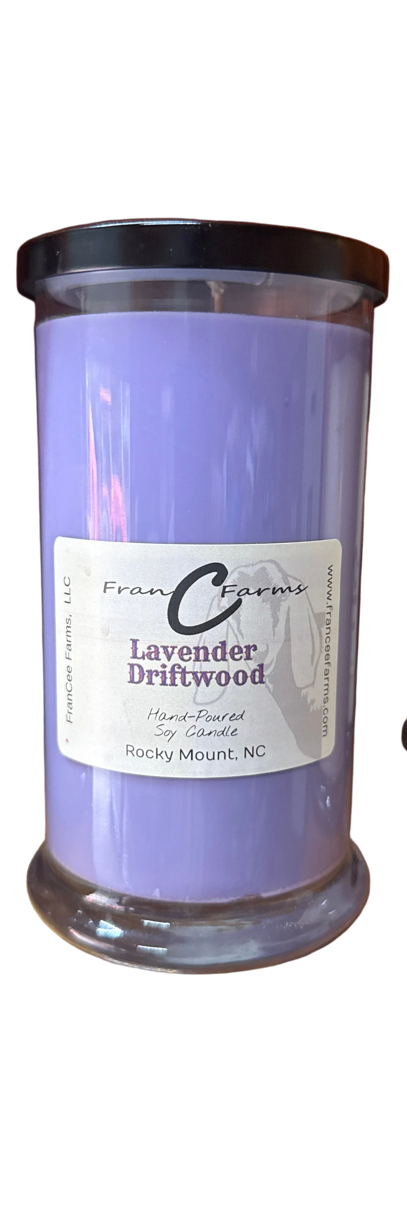 Lavender Driftwood Soy Candle in a glass jar, featuring a fresh woodsy aroma with floral and masculine notes.