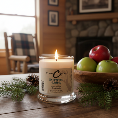 Evergreen and Apple Soy Candle - 12 oz Status Jar with pine and apples in a cozy cabin setting.