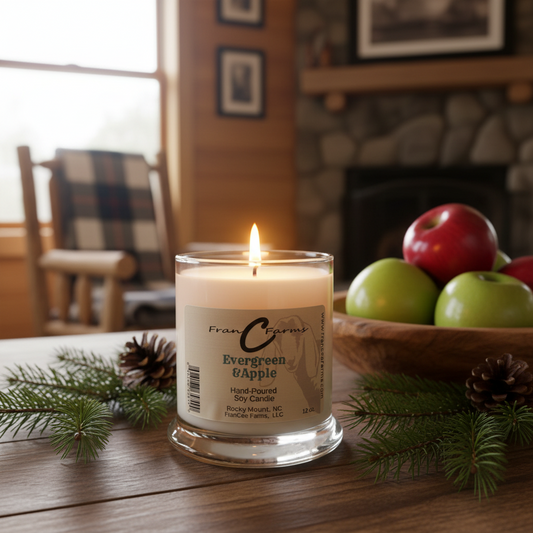 Evergreen and Apple Soy Candle - 12 oz Status Jar with pine and apples in a cozy cabin setting.