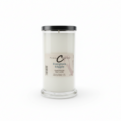 Evergreen & Apple Soy Candle in a clear jar, hand-poured, 22 oz for a fresh, warm atmosphere.