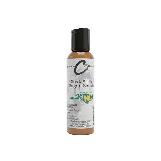 Goat Milk Sugar Scrub bottle showcasing luxurious skincare benefits and natural ingredients for soft, hydrated skin.