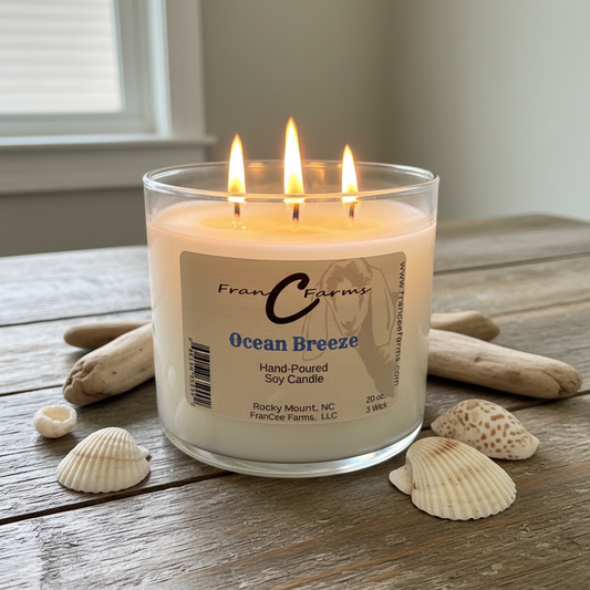 Ocean Breeze Soy Candle - 20 oz. 3 Wick, hand-poured, with fresh aquatic aroma and seashells on wooden table.