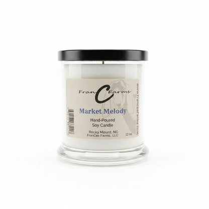 Market Melody soy candle in a clear jar with a black lid, hand-poured, 12 oz from FranC Farms.