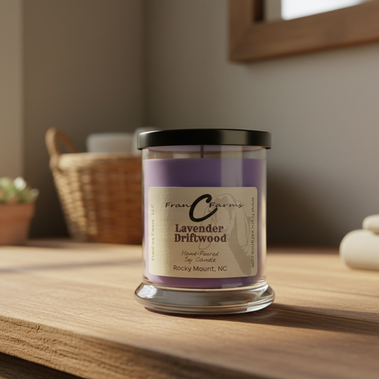 Lavender Driftwood Soy Candle - 12 oz status jar on wooden table with modern decor and natural light.