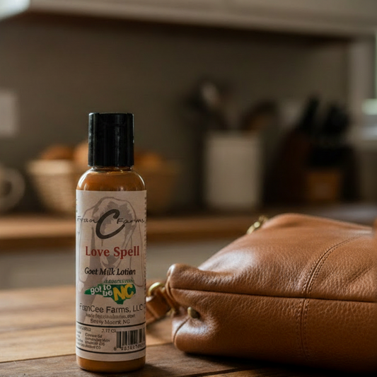 Love Spell Goat Milk Lotion bottle on a kitchen counter, showcasing its luxurious formula and floral fragrance.